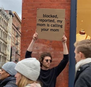 guy-holding-sign